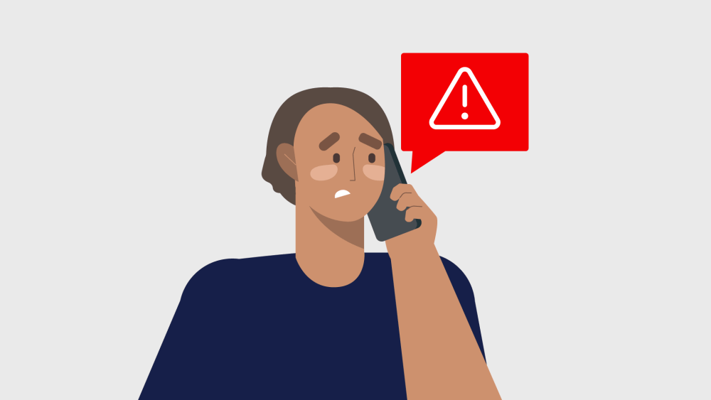 worried person with mobile to ear listening to scam call
